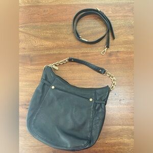 Michael Kors black leather hobo bag with gold accents